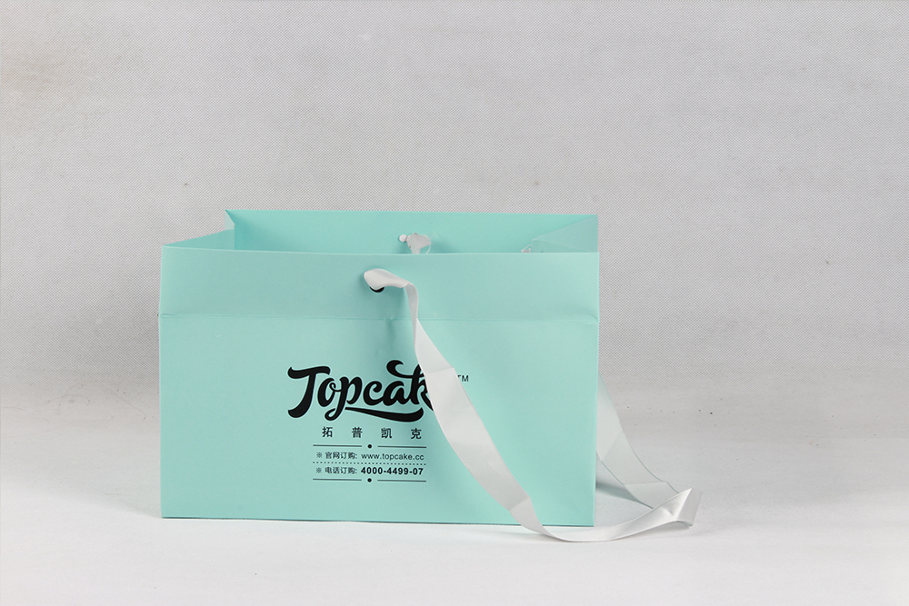 TOPCAKE中號(hào)精美化妝品白卡紙袋定制 TOPCAKE中號(hào)精美化妝品白卡紙袋定制