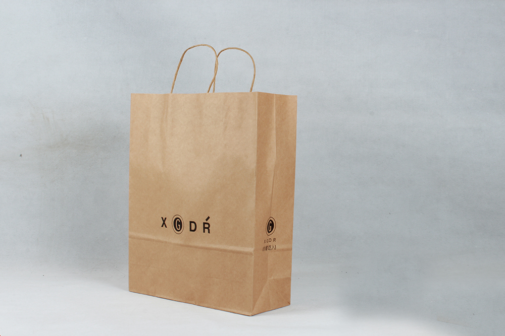 XGDR時(shí)尚服裝牛皮紙袋定制 XGDR時(shí)尚服裝牛皮紙袋定制